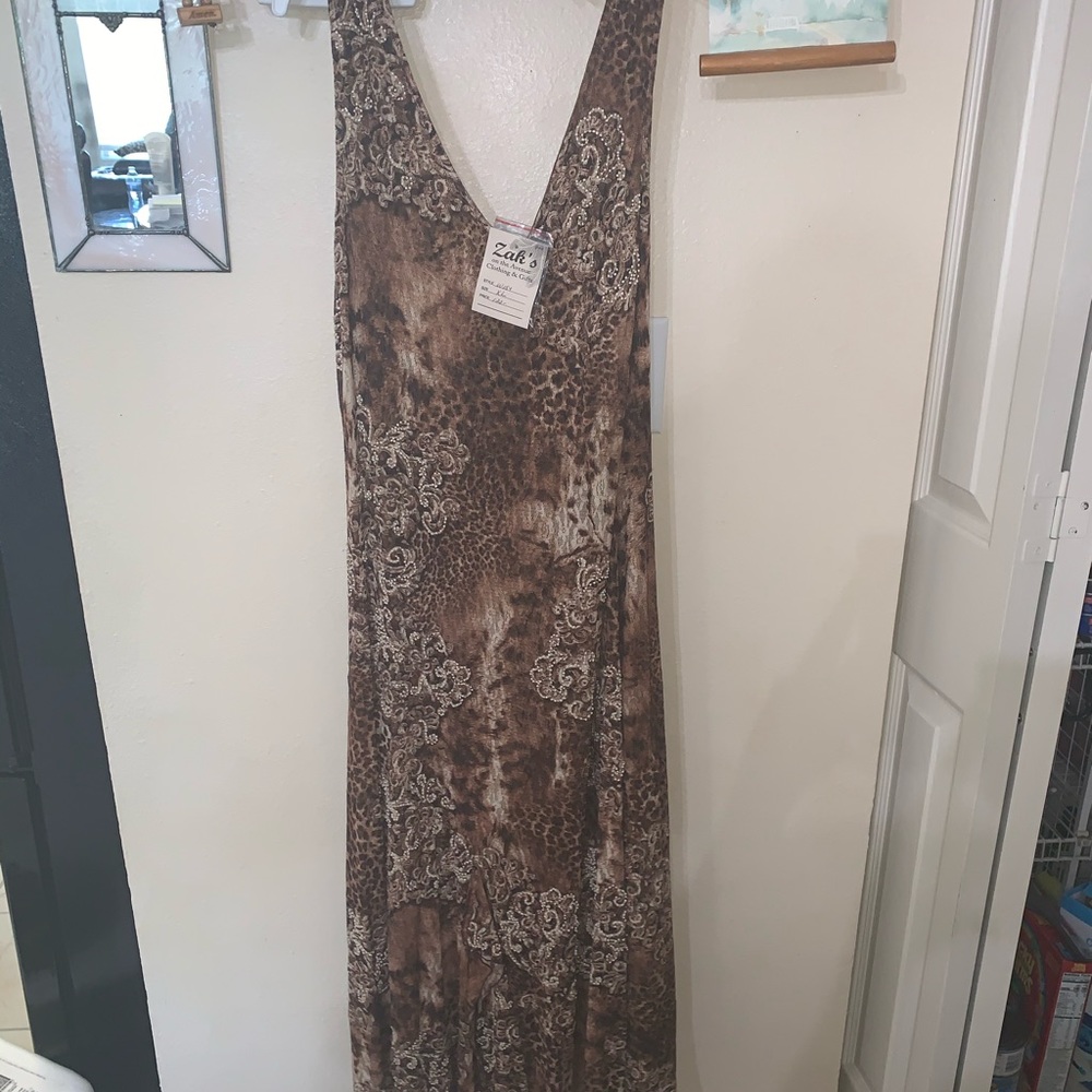 New with tags. Cheetah dress size XL with Shaw